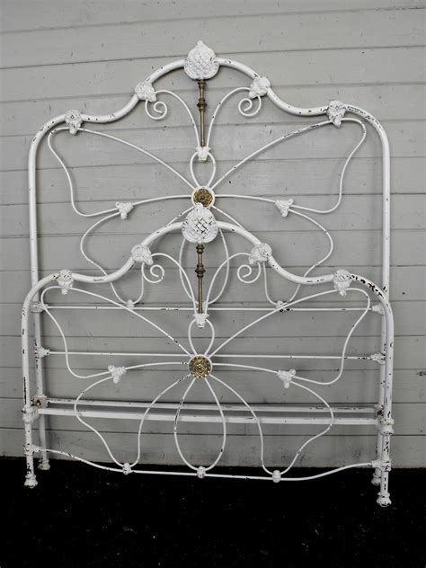 Butterfly Cathouse Antique Iron Beds