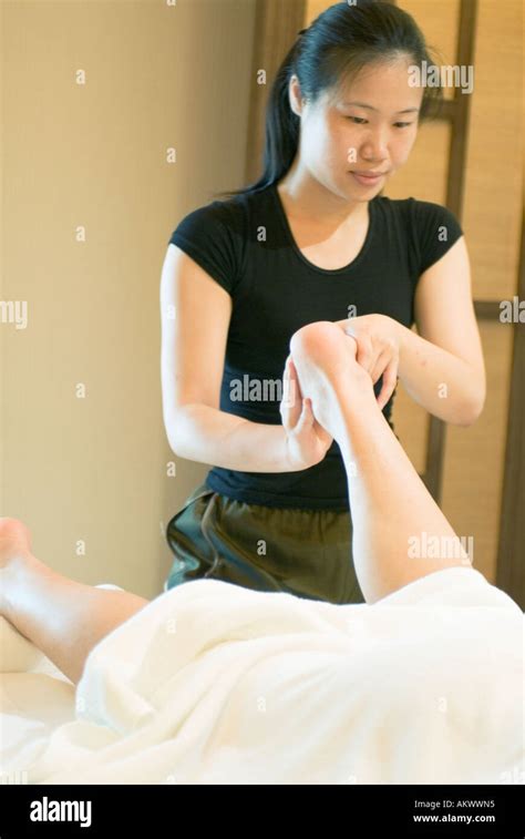 Asian Girl Masseuse Giving Foot Hi Res Stock Photography And Images Alamy