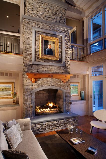 Large Stacked Stone Fireplace With Wood Mantle And Stone Hearth