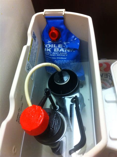 The dual flush toilet features two buttons, which are usually placed on top of the tank and allow you to control the amount of water being dispensed. Installing a Toilet Tank Bag - Green Living Ideas