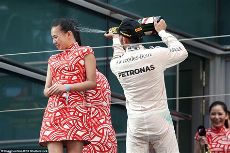 F1s Lewis Hamilton Under Fire For Spraying Hostess At Chinese Grand