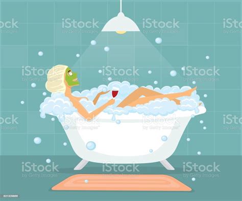 Woman Taking A Bubble Bath In A Vintage Bathtub Relaxing Drinking Wine