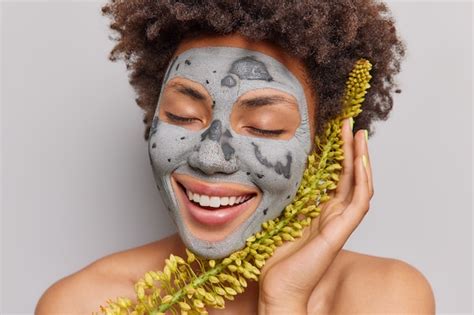 Premium Photo Woman Gets Facial Mask Made On Natural Herbal
