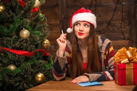 Beautiful Girl Writing New Year And Christmas Congratulation Stock