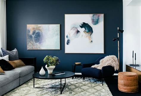 A light blue ceiling mimics the daytime sky, creating a vast feeling of space. Dark wall and beautifully contrasting art | painting ideas ...
