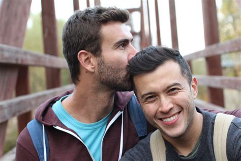 Gay Men Couple Kiss Stock Getty