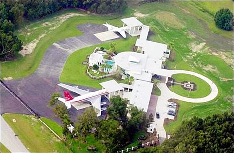 This is a set of houses that have their own private airstrip. John Travolta's House with Runway for his Airplanes ...