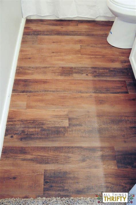 Vinyl tile flooring imitates the look of natural stone or wood just perfectly. How to Easily Install Peel and Stick Vinyl | Bathrooms ...