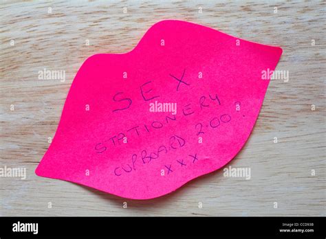 Pink Lips Post It Note Sticker Left On Desk With Hand Written Message