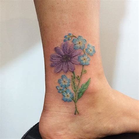 Some of the simple tattoo designs, a look lover should get a bundle of books inked where there will be books just the way you want them. Top 30 Forget Me Not Tattoos | Best Forget Me Not Tattoo ...
