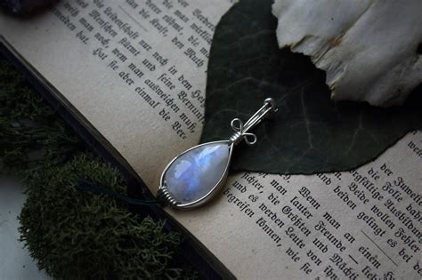These Beautiful Wire Wrapped Rainbow Moonstone Pendants Are Available