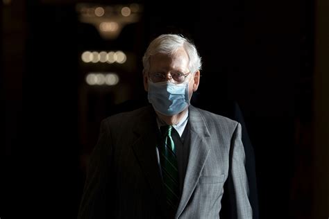 Senate majority leader mitch mcconnell reaches to get a dropped face mask as he talks to the media after the republican policy luncheon on. For Mitch McConnell, Keeping His Senate Majority Matters ...