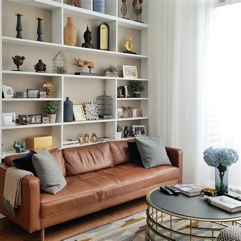 Shelving Behind The Sofa To Bring A Warm Feeling Into A Contemporary