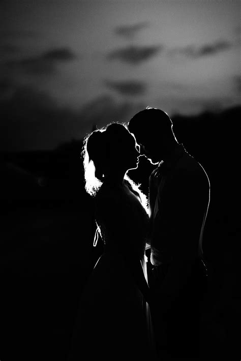 Black And White Photography Silhouette Of Young Couple Embracing In
