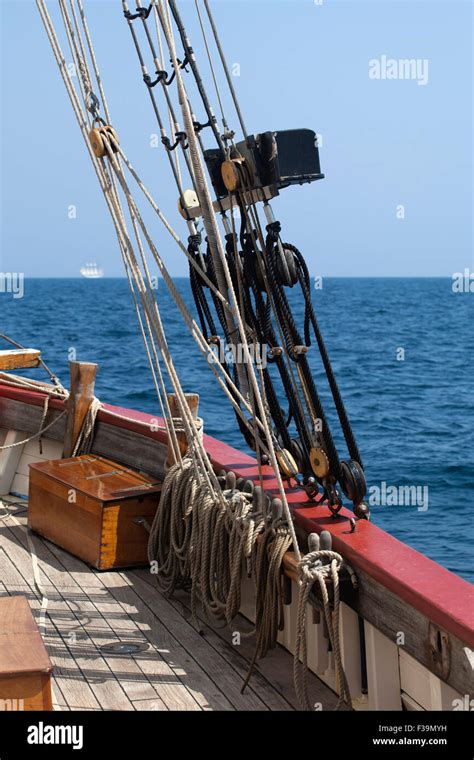 Rigging Of A Tall Ship Against Blue Sky And Sea Stock Photo Alamy