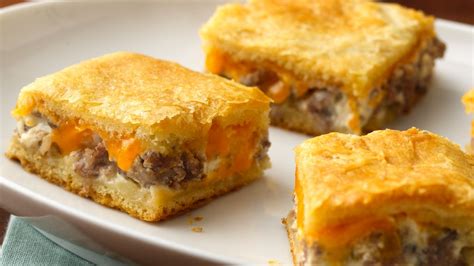 Place bacon on top and season all over with . Sausage and Cheese Crescent Squares recipe from Pillsbury.com