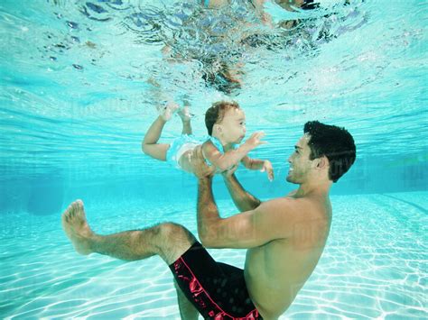 Topless Swimming With Daddy