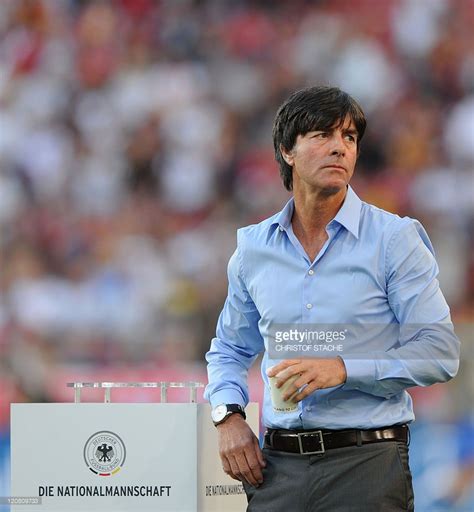 germany s head coach joachim loew leaves the pitch after the warming up ahead of the germany vs