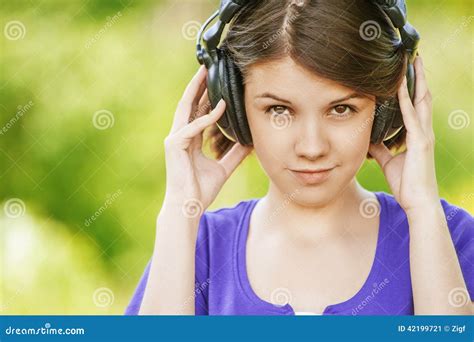 Close Up Portrait Of Young Woman Wearing Headphones Stock Image Image
