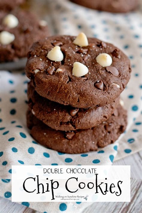 These double chocolate chip cookies are ultra chocolatey, fudgy in the middle, crisp round the edges and delicious all over. Double Chocolate Chip Cookies | Walking On Sunshine Recipes