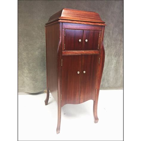 A given album or single might have been released with several different labels on the disc itself, even among releases by the same record company. Antique Victrola Wood Record Player Cabinet | Chairish