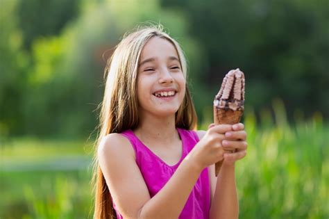 Free Photo Smiling Girl Holding Ice Cream