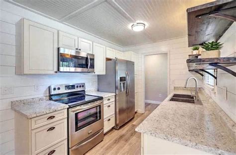 Kitchens are a common place to find shiplap walls. Shiplap Kitchens (Design Ideas) - Designing Idea