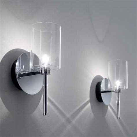 A row of pendant lights or sconces. Spillray Wall Sconce - Contemporary - Wall Sconces - by ...