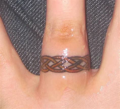 Celtic Knot Wedding Ring Tattoo Designs Tattoo Studio Design