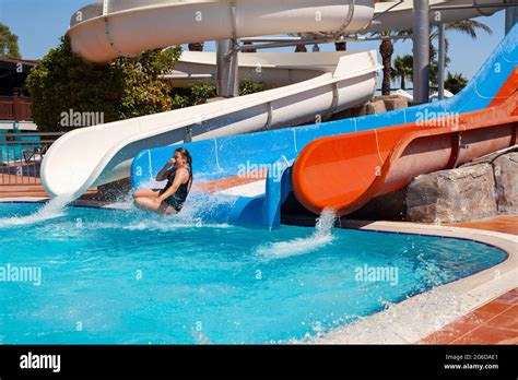 Little Girl Going Down Slide Hi Res Stock Photography And Images Alamy