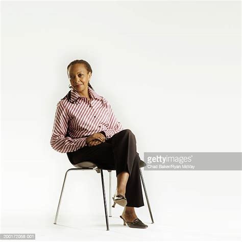Sitting Cross Legged White Background Photos And Premium High Res