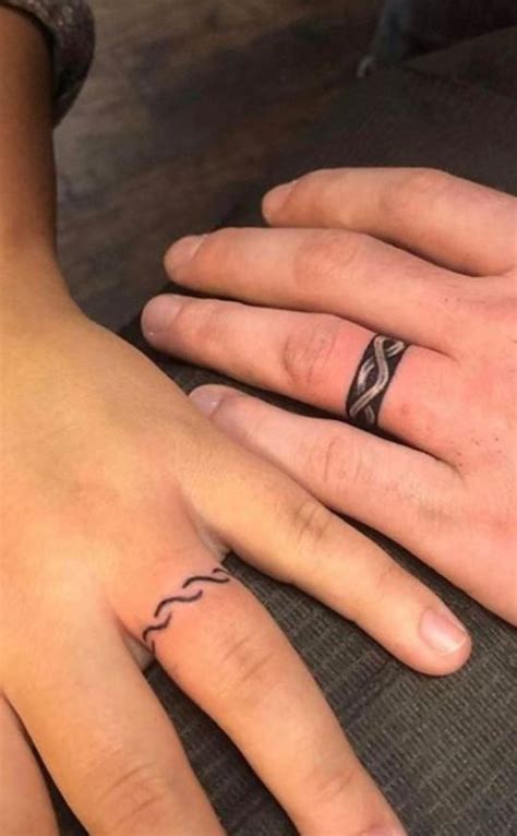 Unique Wedding Ring Tattoos Youll Need To See Tattoo Me Now Tattoo Wedding Rings Ring