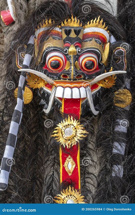 Traditional Balinese Barong Mask On Street Ceremony In Island Bali