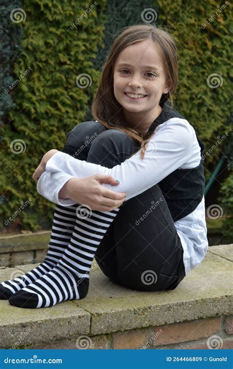 happy teeny with striped socks stock image image of girl cute 264466809