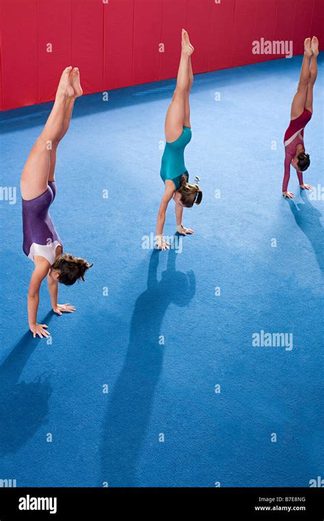 Gymnasts Doing Handstands Stock Photo Alamy