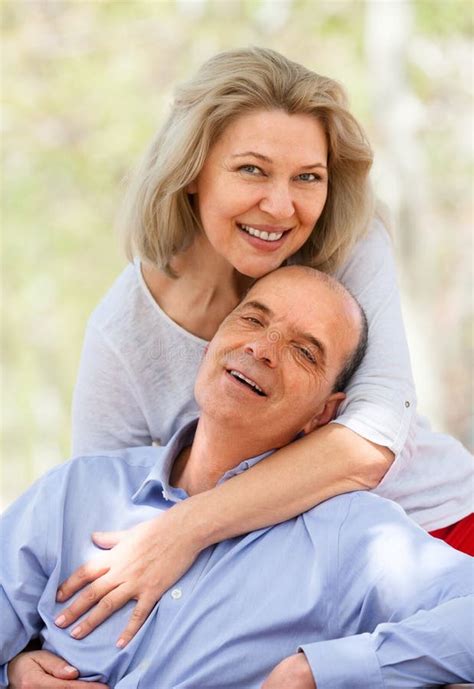 Happy Aged Man And Woman Hugging Each Other Stock Photo Image Of Ordinary Leisure