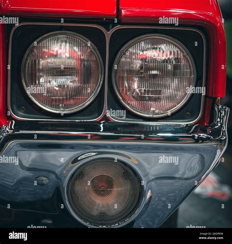 Classic Car Headlights Close Up The Concept Of A Poster On The Wall