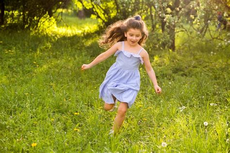 Free Photo Cute Little Girl Running In Garden