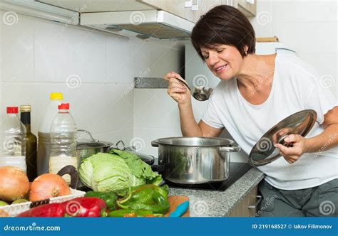 Mature Woman Kitchen Soup Stock Image Image Of Steam 219168527