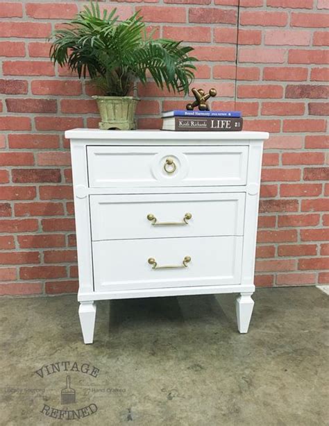 Most of these ikea dresser hack only require a can of paint and some new knobs—you've got this. White Nightstand with gold hardware | Painting furniture ...