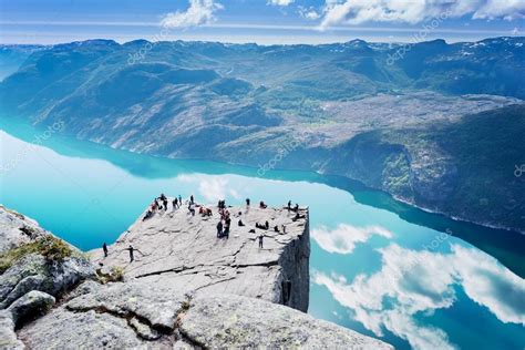Preikestolen (the pulpit rock), the lysefjord, lake bondhusvatet, låtefoss waterfall, hotel ullensvang in lofthus, the hardangerfjord video: Cliff Preikestolen op fjord Lysefjord — Stockfoto ...
