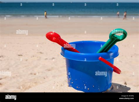 Childrens Beach Toys Buckets Spade And Shovel On Sand On A Sunny