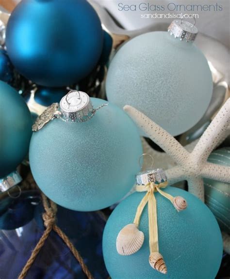 Diy Frosted Glass Ornaments That Look Like Sea Glass Decorated With Little Shells On Raffia