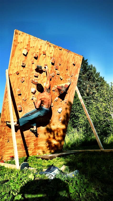 My Man On His Homemade Bouldering Wall Home Climbing Wall Diy