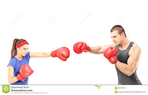 Female And Male Boxers With Boxing Gloves During A Match