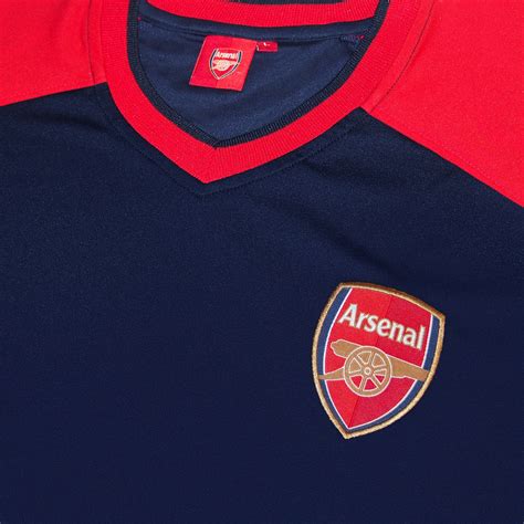 Arsenal plays in the premier league, the top flig. Arsenal FC Official Football Gift Mens Poly Training Kit T ...