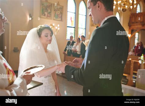 Christian Wedding Couple At Catholic Church Stock Photo Alamy