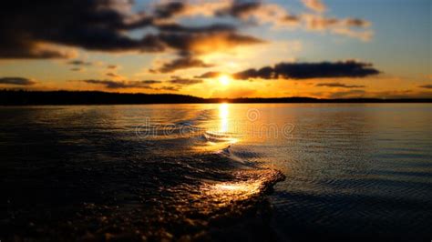 Lake At Sunset With Ripples On The Water Stock Photo Image Of Night
