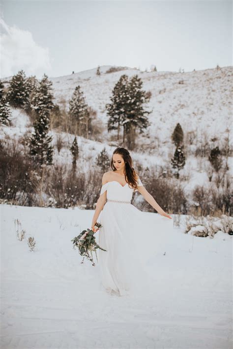 Winter Bride In The Snow Groom Wedding Attire Outdoorsy Wedding