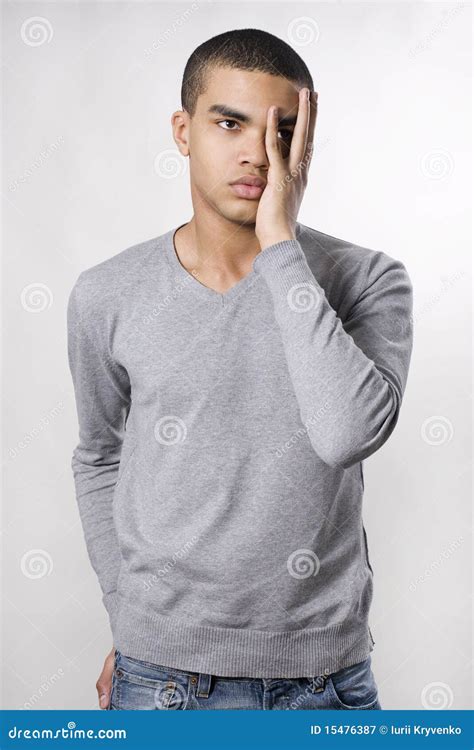 Young Man With Hand Over Eyes Stock Image Image Of Fingers Adult